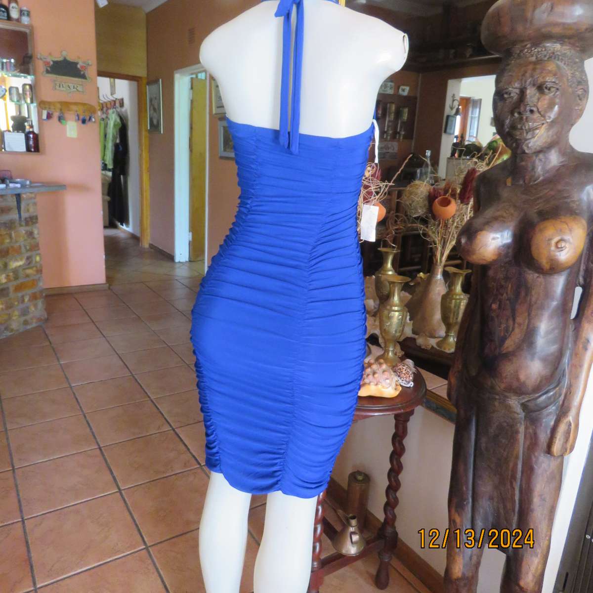 Stunning royal blue stretch polyester bodycon halter neck evening dress.Vertical elasticated.Size 34