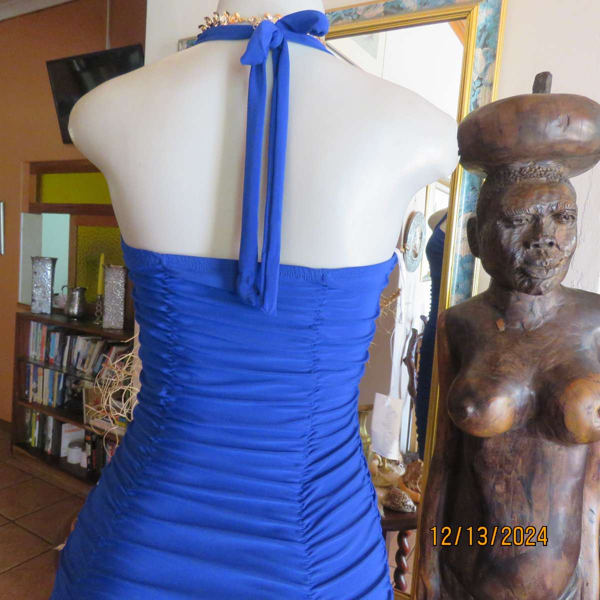 Stunning royal blue stretch polyester bodycon halter neck evening dress.Vertical elasticated.Size 34
