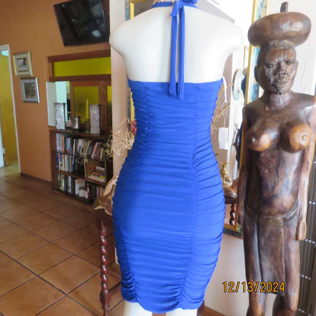 Stunning royal blue stretch polyester bodycon halter neck evening dress.Vertical elasticated.Size 34