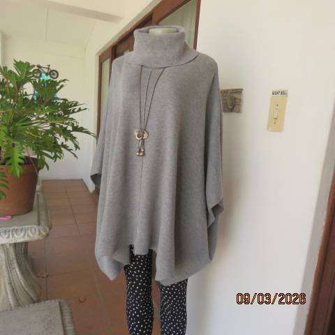 Donatella light grey acrylic knit poncho with high fold-over polo neck, size 38-42