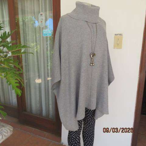 Donatella light grey acrylic knit poncho with high fold-over polo neck, size 38-42