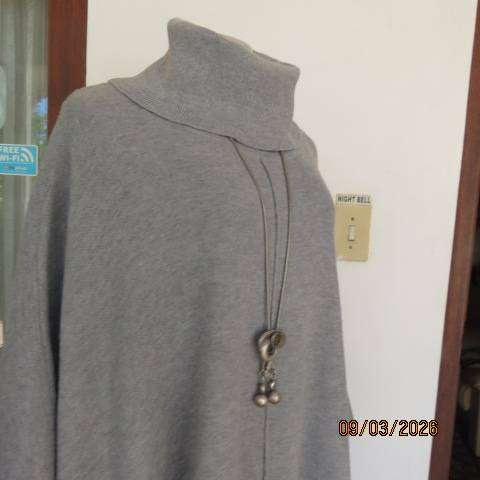 Donatella light grey acrylic knit poncho with high fold-over polo neck, size 38-42
