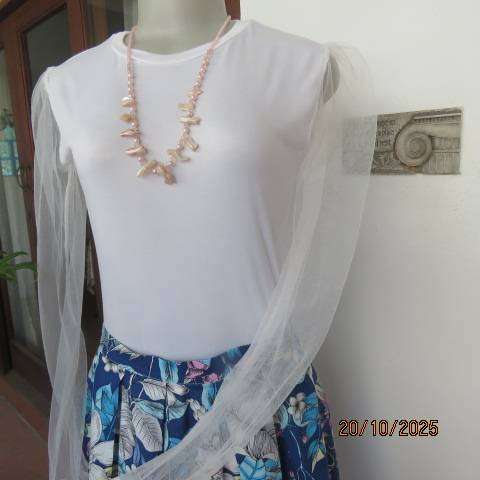White stretch polyester bodyshirt with sheer sleeves. Press button closure. Size 34.