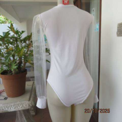 White stretch polyester bodyshirt with sheer sleeves. Press button closure. Size 34.