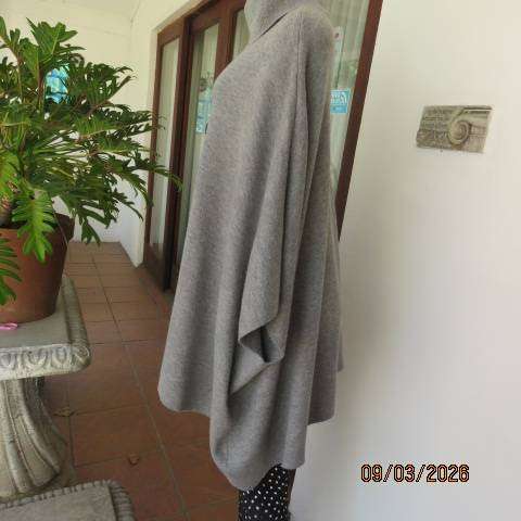 Donatella light grey acrylic knit poncho with high fold-over polo neck, size 38-42