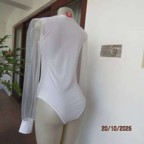 White stretch polyester bodyshirt with sheer sleeves. Press button closure. Size 34.
