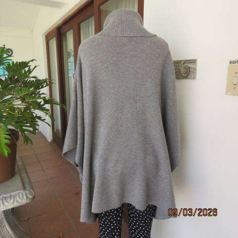 Donatella light grey acrylic knit poncho with high fold-over polo neck, size 38-42