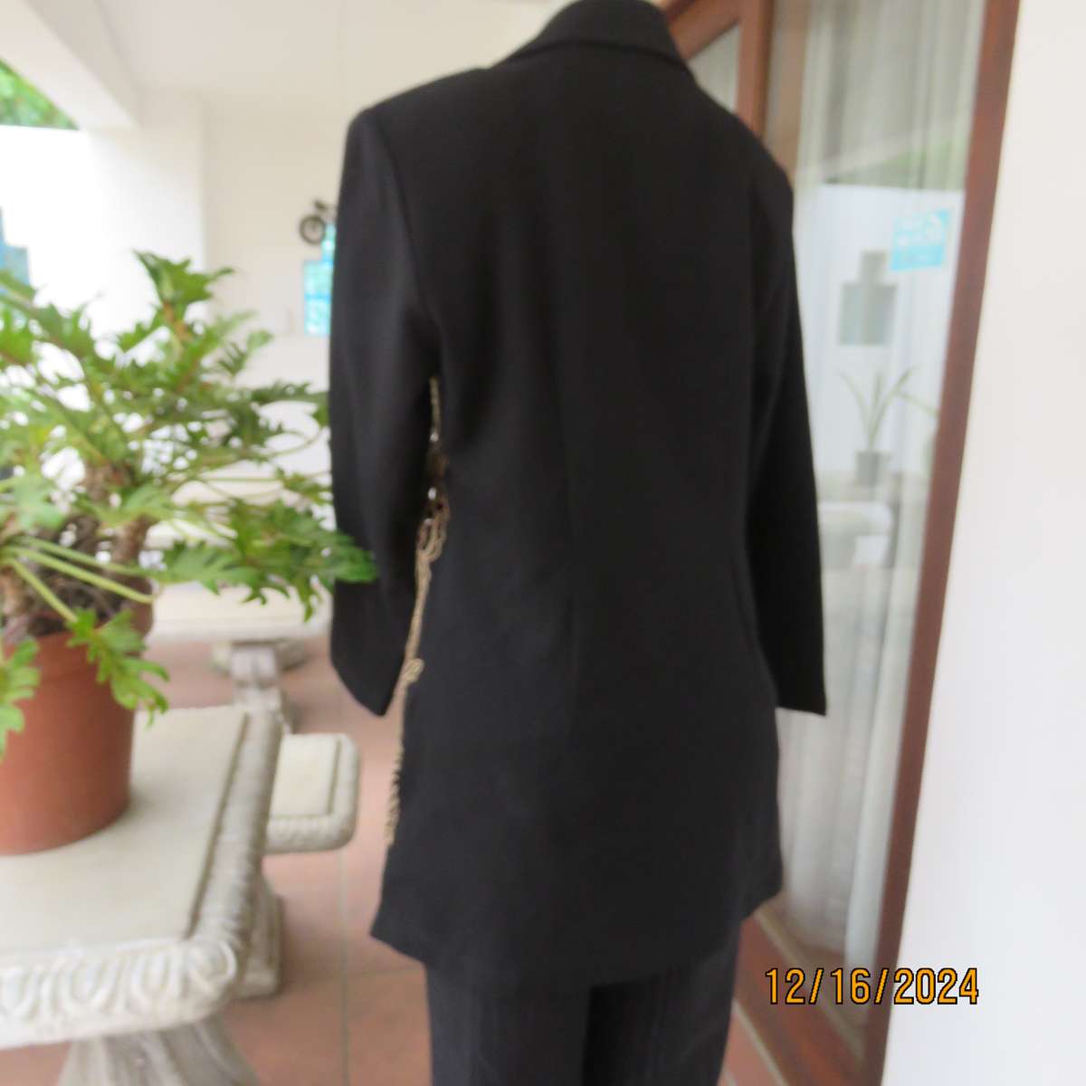 PIKO long sleeve evening jacket with cut-out gold embroidery on fronts.Size 36.Lapel collar.As new