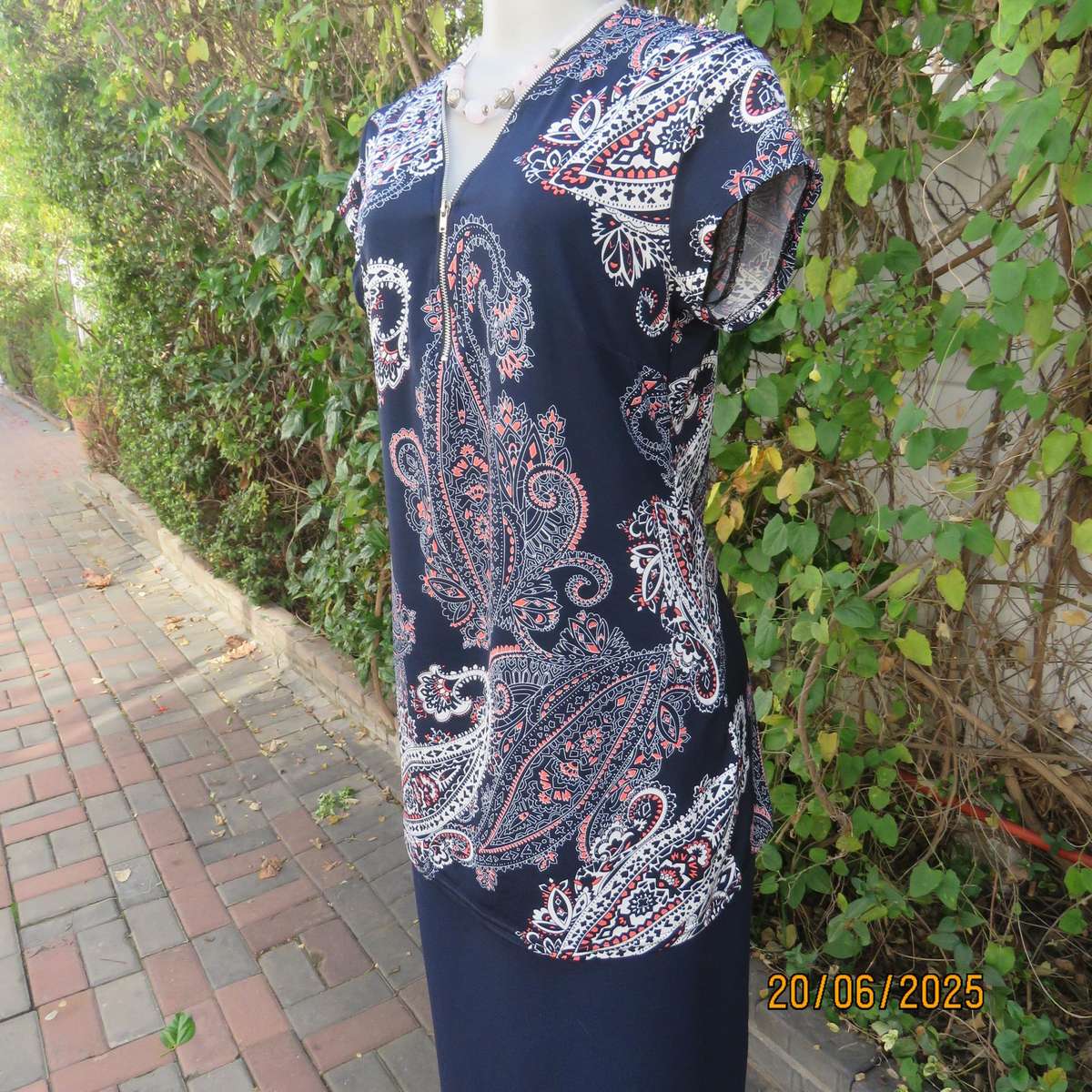 AMARA navy capped sleeve top with crimson-white baroque print. V zip up front. Size 36