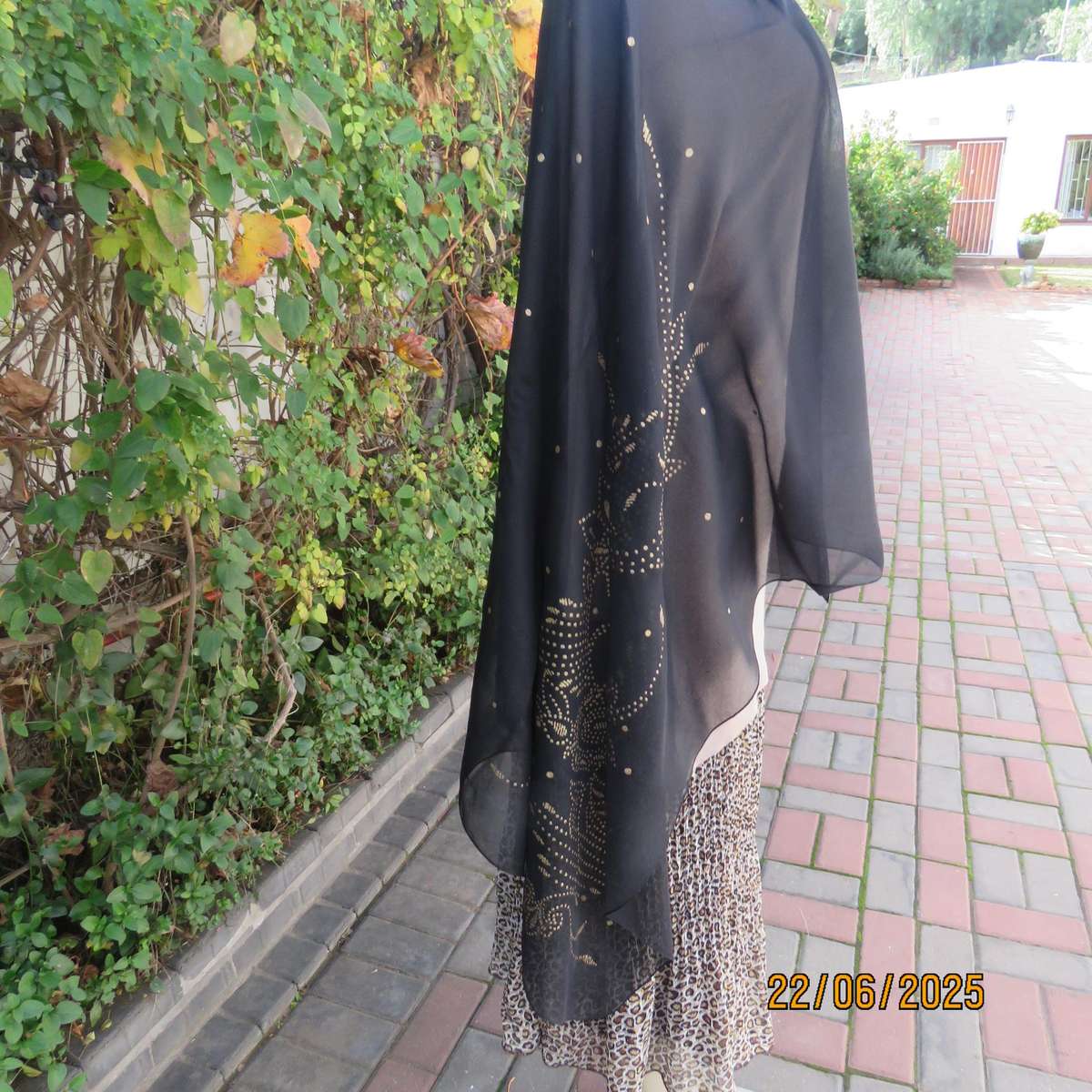 Black sheer wrap with luxury gold dots and pattern. Size 160cm x 95cm.