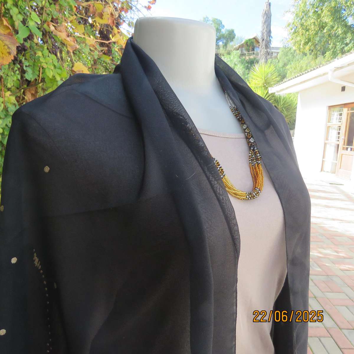 Black sheer wrap with luxury gold dots and pattern. Size 160cm x 95cm.