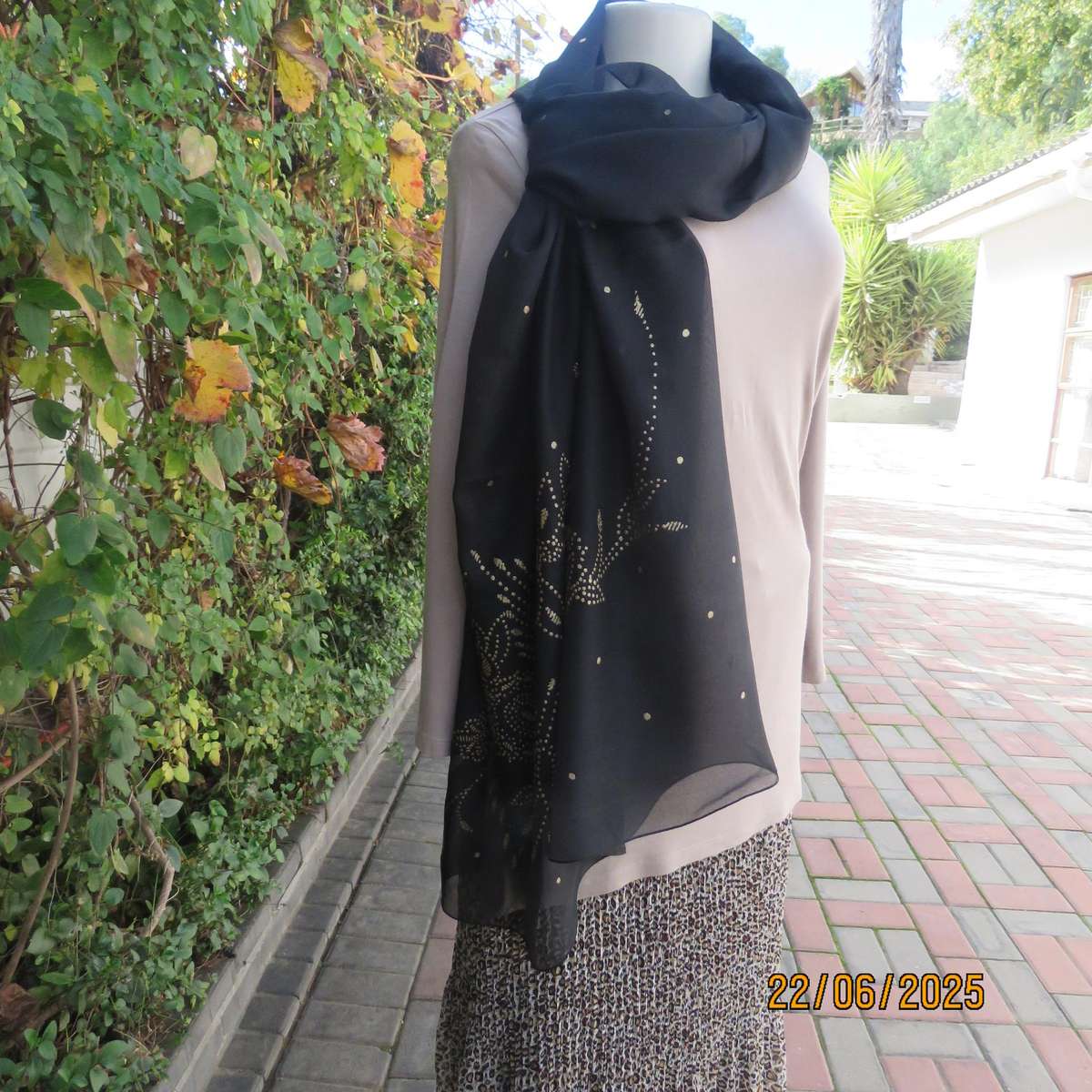 Black sheer wrap with luxury gold dots and pattern. Size 160cm x 95cm.