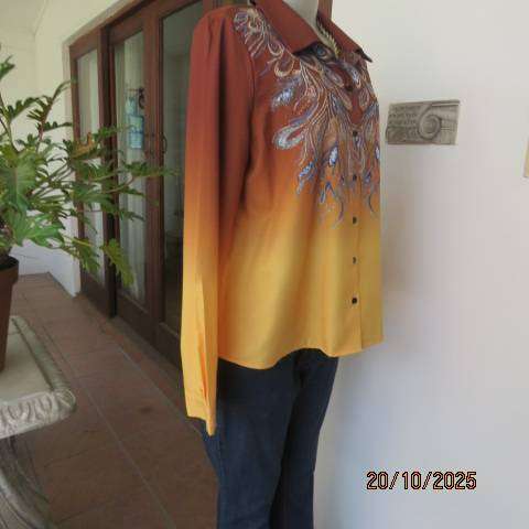 Golden brown-rust-yellow button down long sleeve top with blue feathery paisley print. Size 40