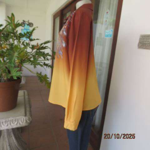 Golden brown-rust-yellow button down long sleeve top with blue feathery paisley print. Size 40