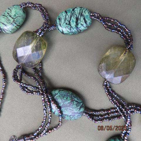 Attractive long green oval beaded necklace with three string tiny connection beads