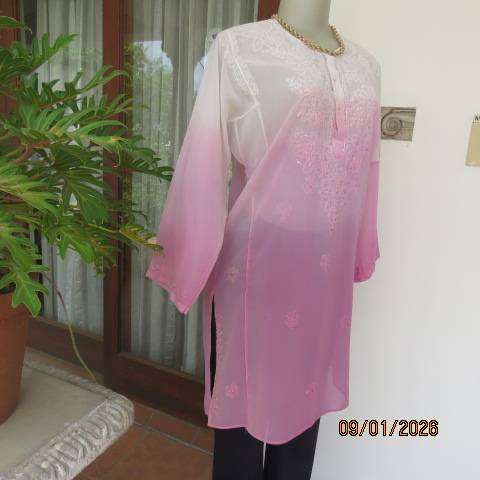 Embroidered long polyester top in shades of pink with 3 button front opening. Size 36-38