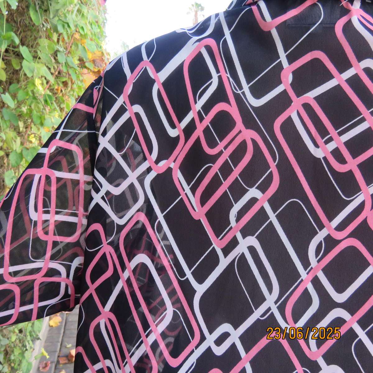 ANNA PIA black sheer polyester sheer polyester top with pink-white link print. Size large 44
