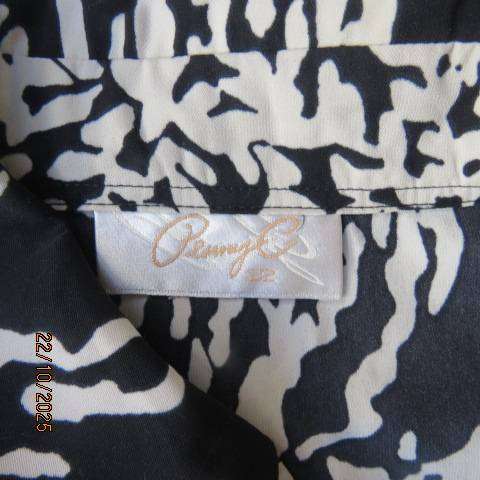 PENNY C black high quality polyester top with white floral print. Size 46-22