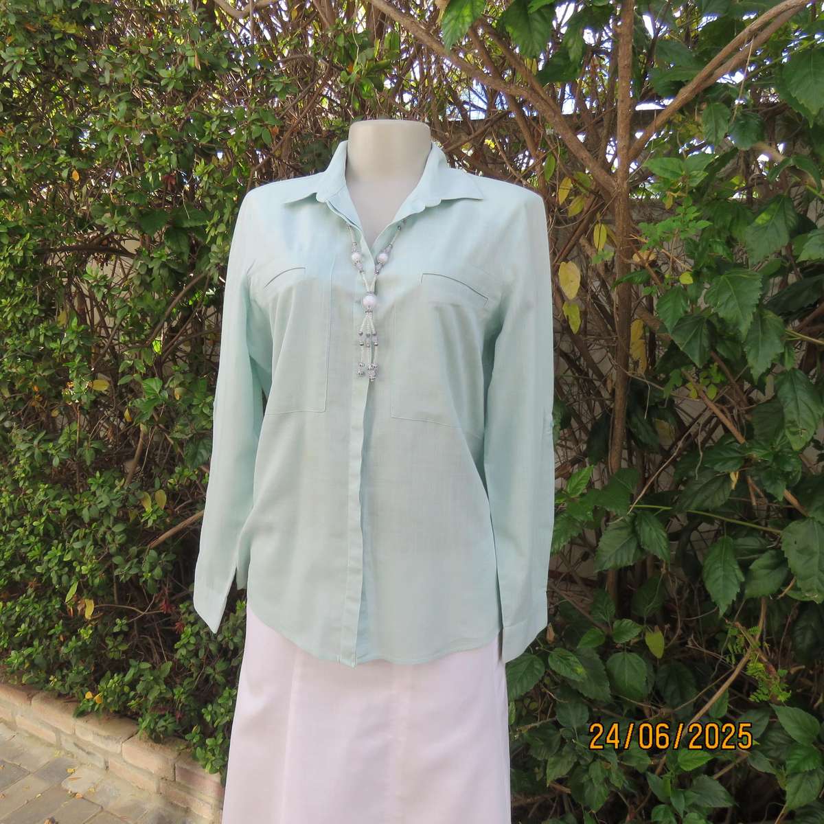 WOOLWORTHS mint green long sleeve cotton shirt size 34. Unique front pockets.
