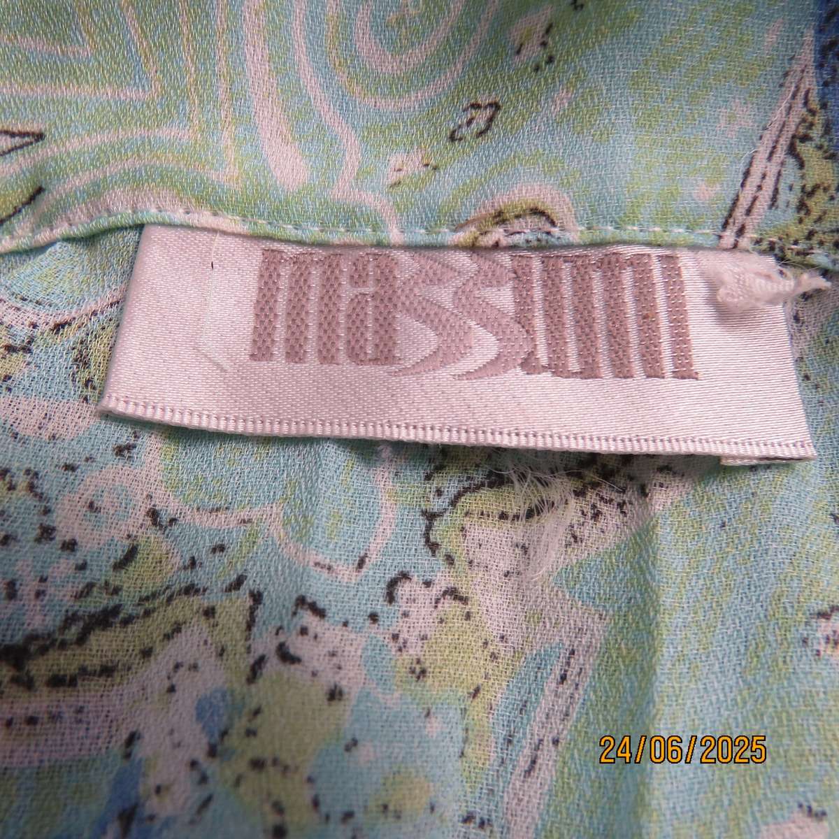 Soft blue-green permanent pleated paisley printed polyester top. Size 38.