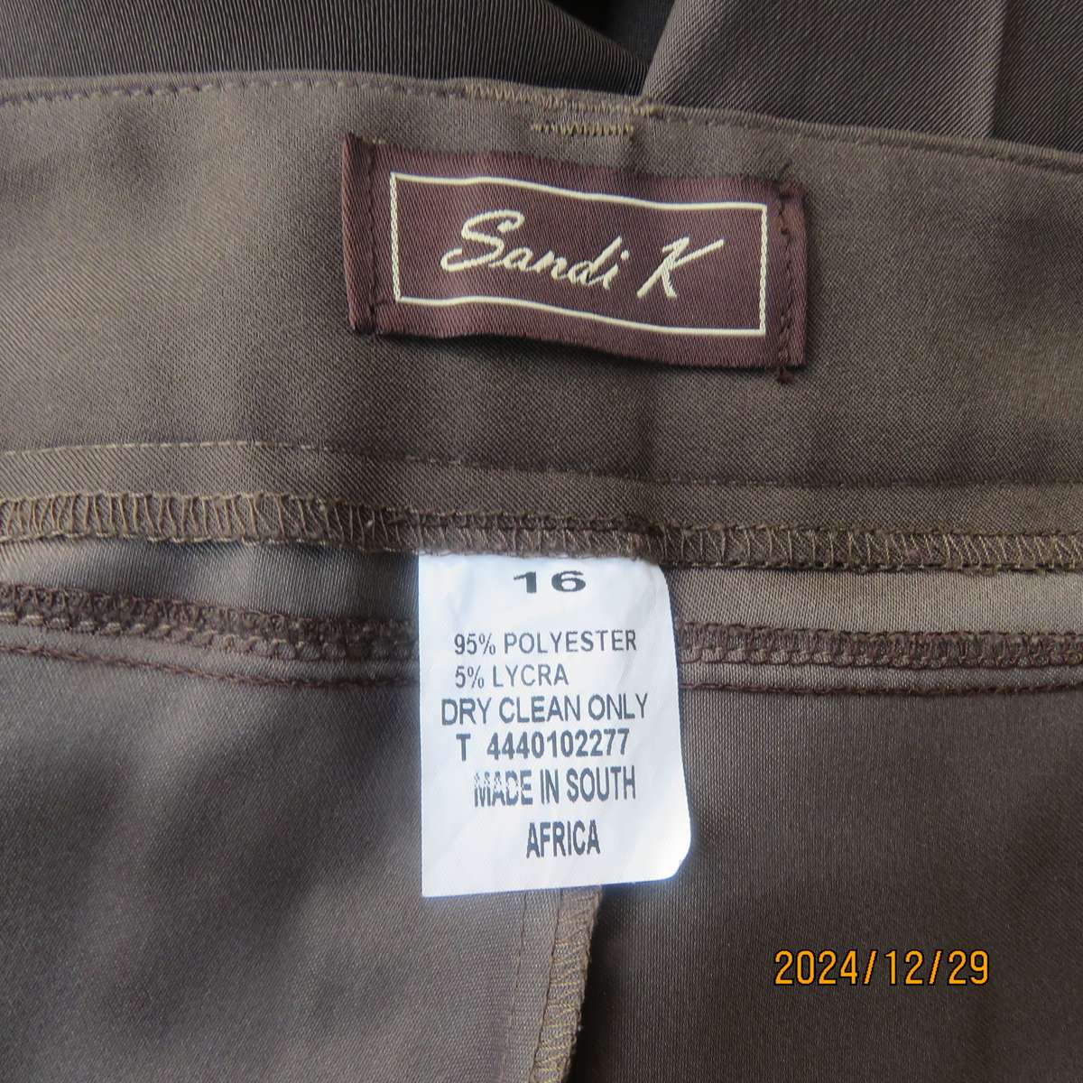 SANDI K medium brown polyester-lycra elegant high quality wide straight legged pants.Size 40-42.