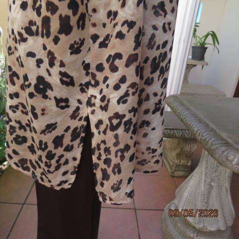 Penny C animal print short sleeve polyester top with button down front open collar size 48