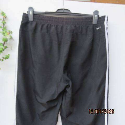 ADIDAS mens black nylon-mesh cropped sport pants with white side stripes. Drawstring Size 36