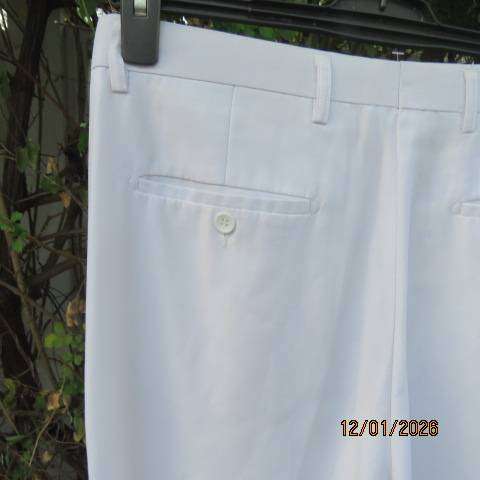 LION KNIGHT white cotton-terylene-silk pants size 34 with back-side pockets. As new