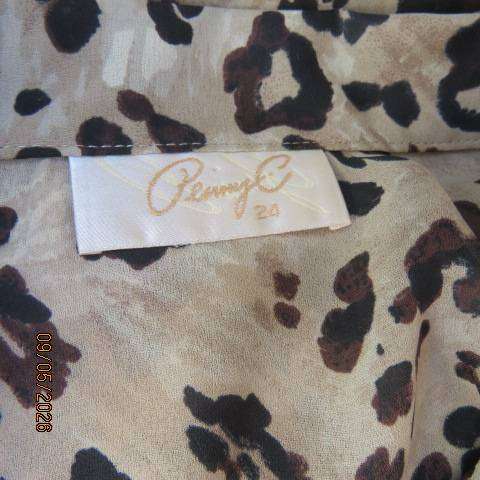 Penny C animal print short sleeve polyester top with button down front open collar size 48