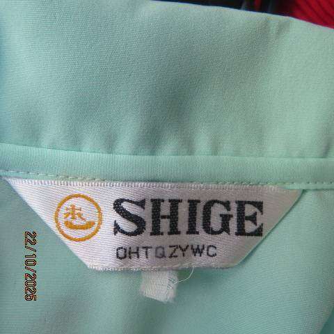 SHIGE mint green short sleeve silky polyester top with richly embroidered collar. Size 42