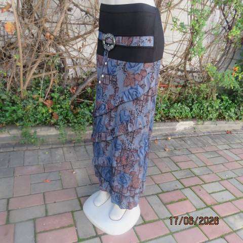 Floral fully lined polyester frilled skirt with black yoke and buckle, size 36