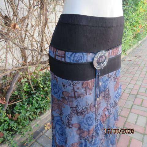 Floral fully lined polyester frilled skirt with black yoke and buckle, size 36