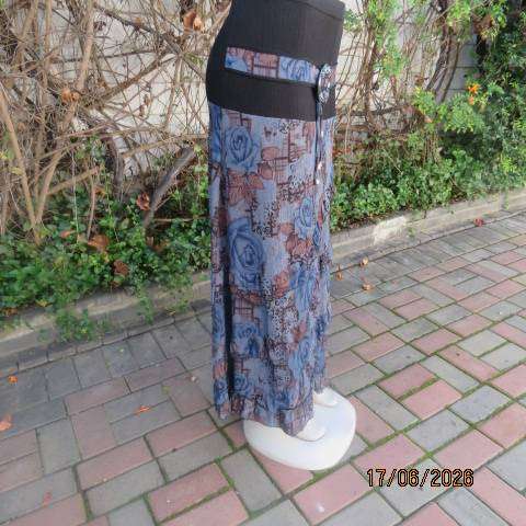 Floral fully lined polyester frilled skirt with black yoke and buckle, size 36