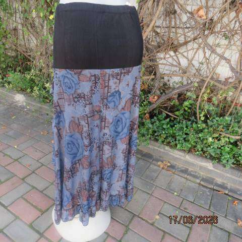 Floral fully lined polyester frilled skirt with black yoke and buckle, size 36