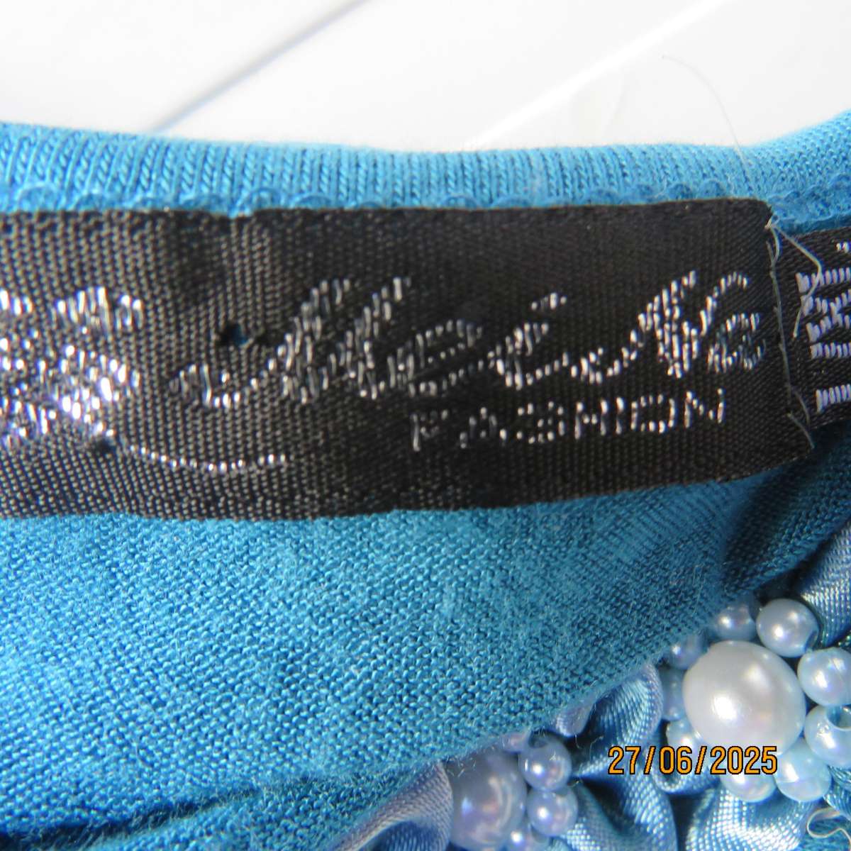 Jade long stretch polycotton slip over top with white polkadots. Capped sleeves. Size 38