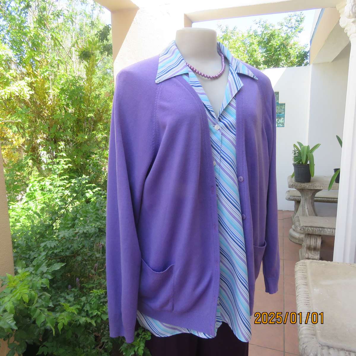 Comfy jacaranda colour acrylic knit long raglan sleeve button down cardigan. Size 40. Two pockets.