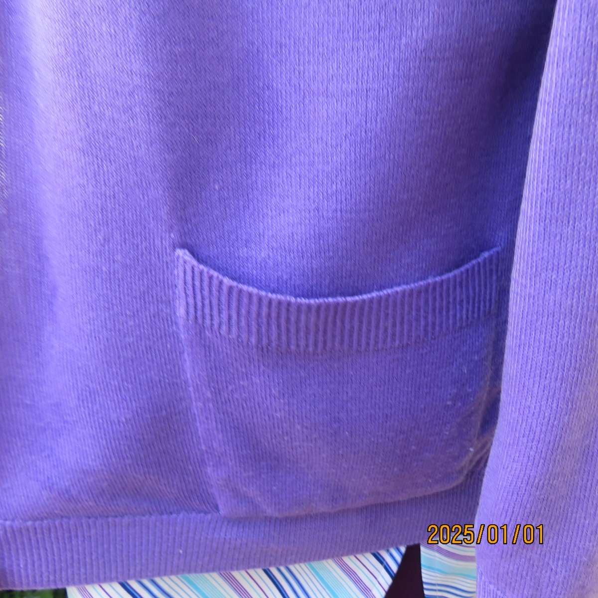 Comfy jacaranda colour acrylic knit long raglan sleeve button down cardigan. Size 40. Two pockets.