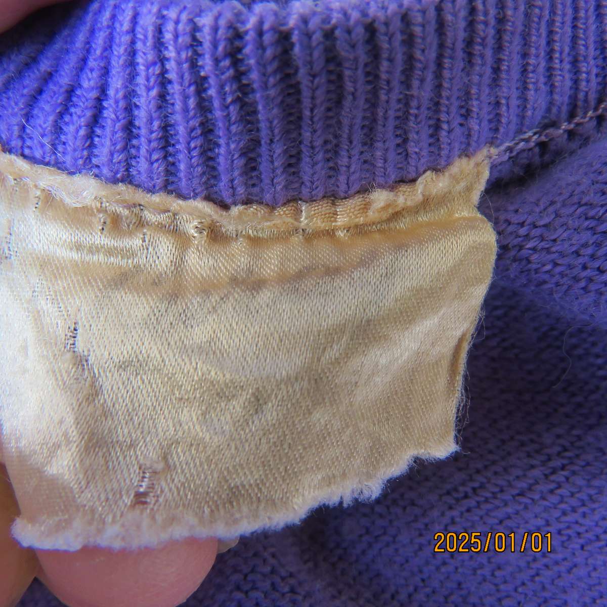 Comfy jacaranda colour acrylic knit long raglan sleeve button down cardigan. Size 40. Two pockets.