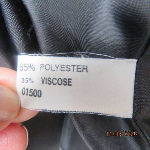White and black check two-piece skirt suit with long sleeve jacket, size 44