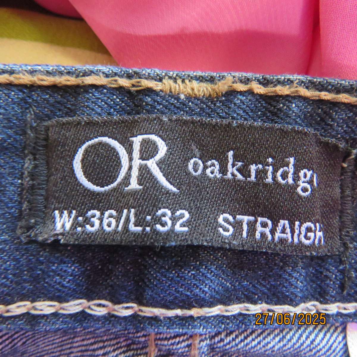 Men's blue denim polycotton straight legged jeans in size 36.