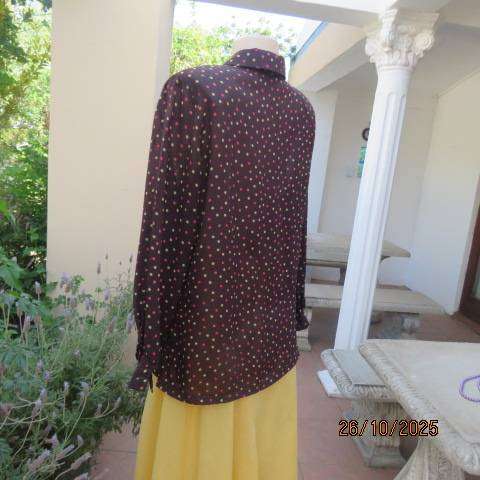 BY DESIGN choc brown sheer polyester long sleeve top with tan-yellow-crimson dots. Size 40