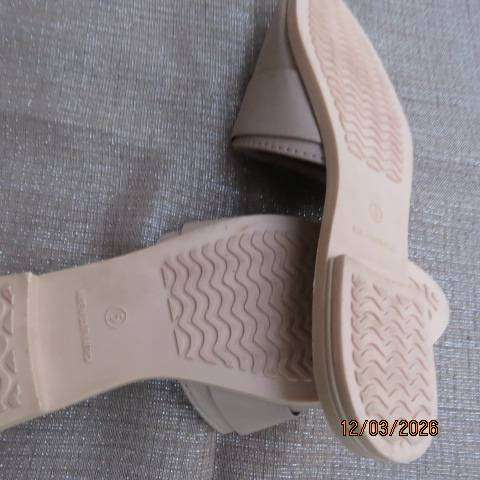 Audacity beige slip-on flats with pointed fronts and buckle detail, size 5