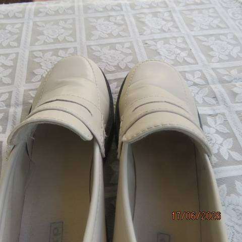 Ladies white chunky loafers in PU with thick black soles and heels, size 7