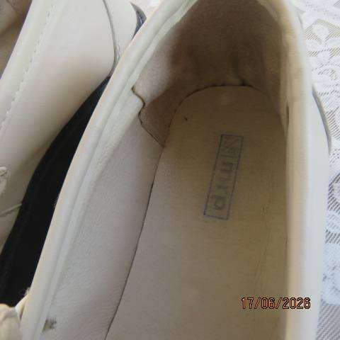Ladies white chunky loafers in PU with thick black soles and heels, size 7