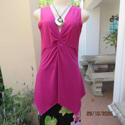 Magenta pink long top with ruched V front. Asymmetrical seamline.Size 36