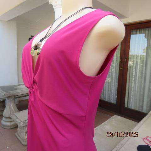 Magenta pink long top with ruched V front. Asymmetrical seamline.Size 36