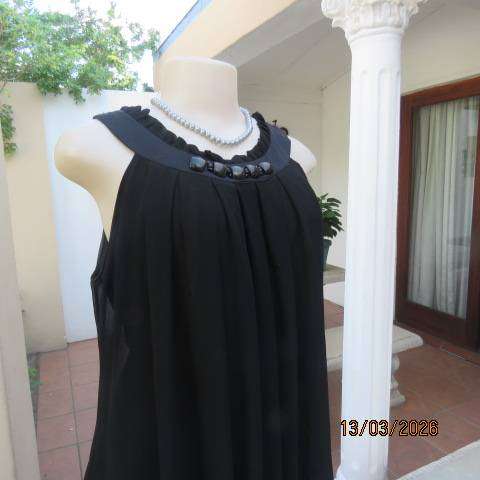 Fv Collection black sheer polyester sleeveless top with narrow frilled yoke, size 34-36