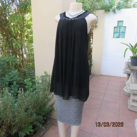 Fv Collection black sheer polyester sleeveless top with narrow frilled yoke, size 34-36