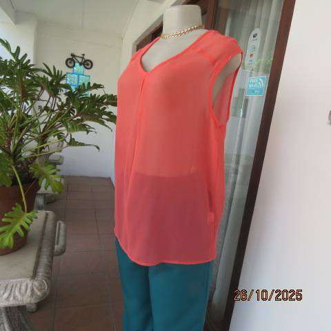 G mtr sheer polyester crimson slip over top. V neck with pleat. Size 36