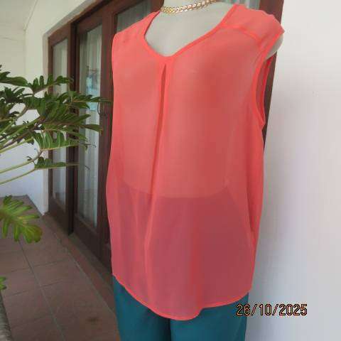 G mtr sheer polyester crimson slip over top. V neck with pleat. Size 36